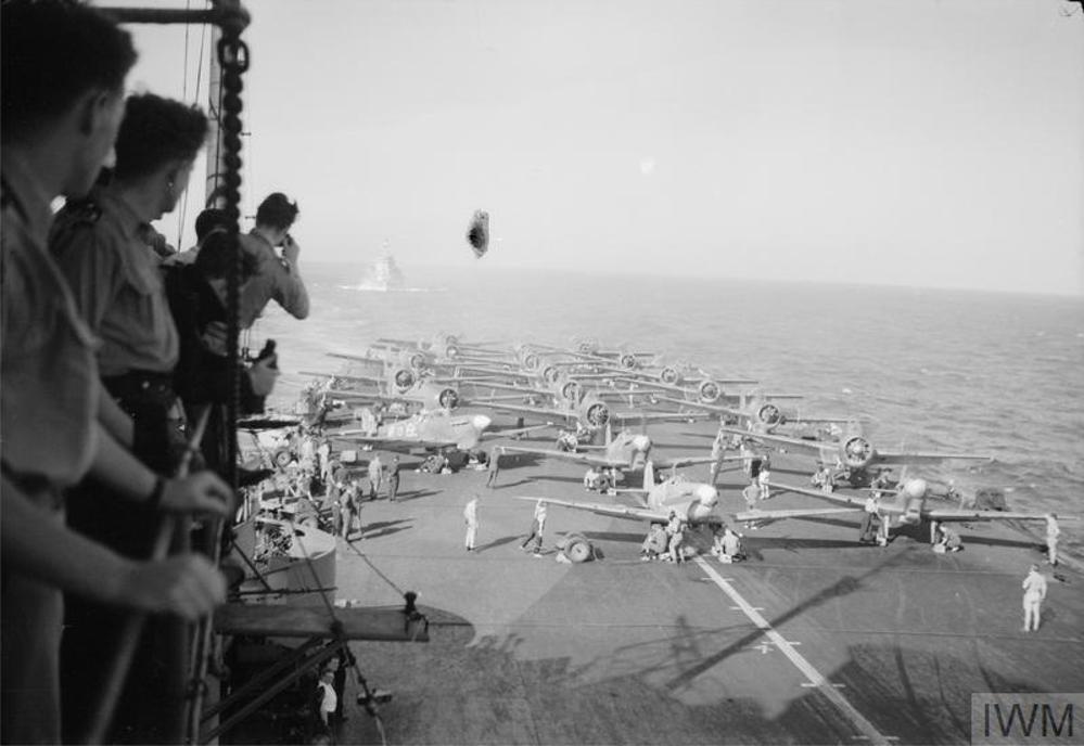 Seafires and Hellcats ranged on the flight deck of HMS Formidable, December 1943.