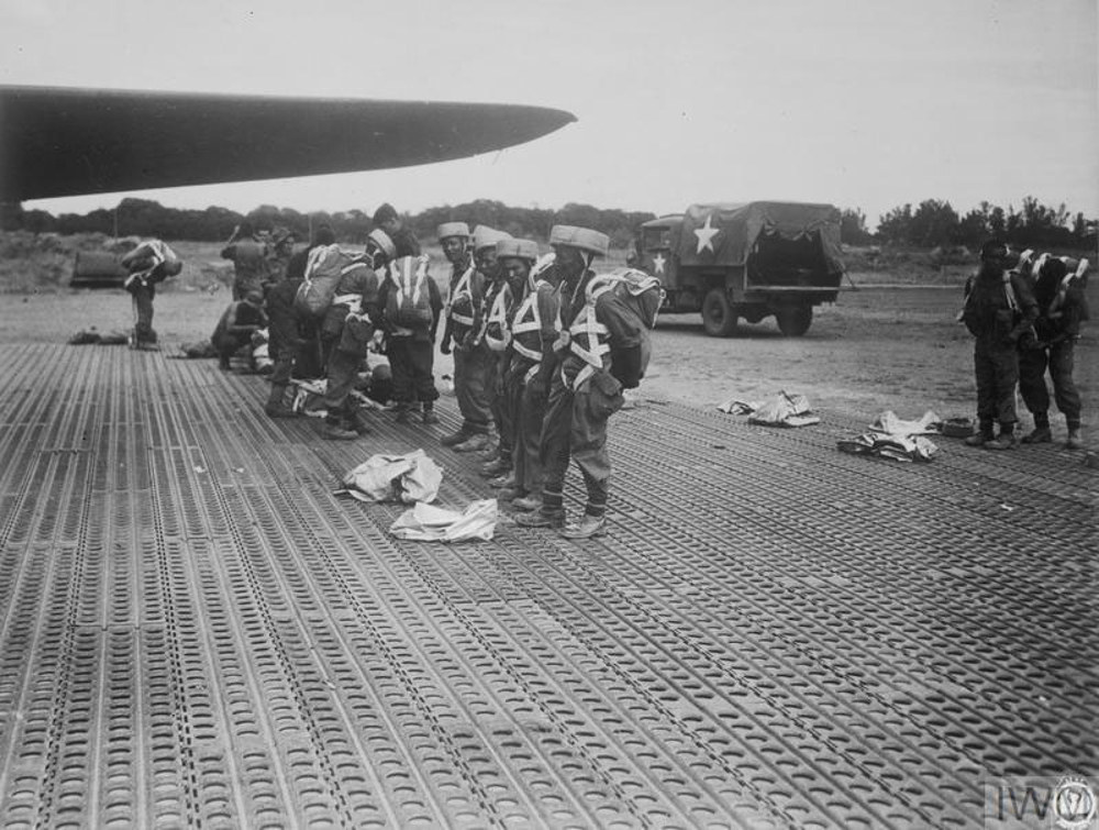 Gurkha paratroopers waiting to board their aircraft in Burma ahead of Operation Dracula.