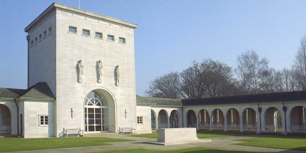 Runnymede Air Services Memorial central courtyard showing back cloisters, central tower, and stone of remembrance.