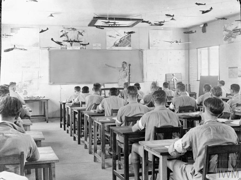 Royal Air Force air gunners receive class-room instruction at an Air Training School in Southern Rhodesia.