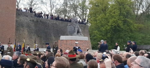 Crowd surrounds the Menin Gate Lions